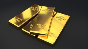 Fine gold bars for purchase with black background.